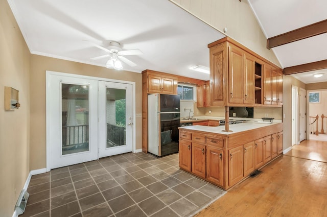1033 Pine Valley Rd, Kingston Springs, TN 37082 - kitchen with freestanding refrigerator, light countertops, a sink, ceiling fan, and baseboards
