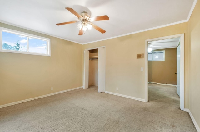1033 Pine Valley Rd, Kingston Springs, TN 37082 - unfurnished bedroom featuring light carpet, baseboards, ornamental molding, a ceiling fan, and a closet