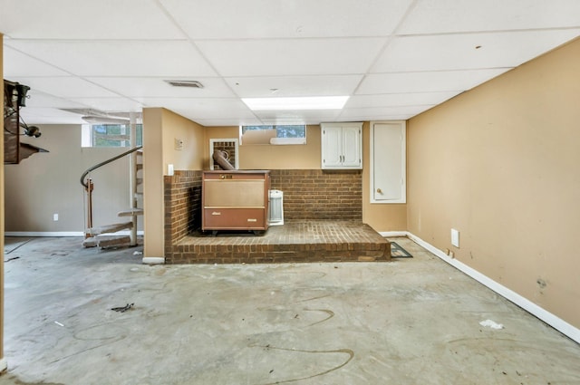 1033 Pine Valley Rd, Kingston Springs, TN 37082 - below grade area featuring a paneled ceiling, stairs, and baseboards