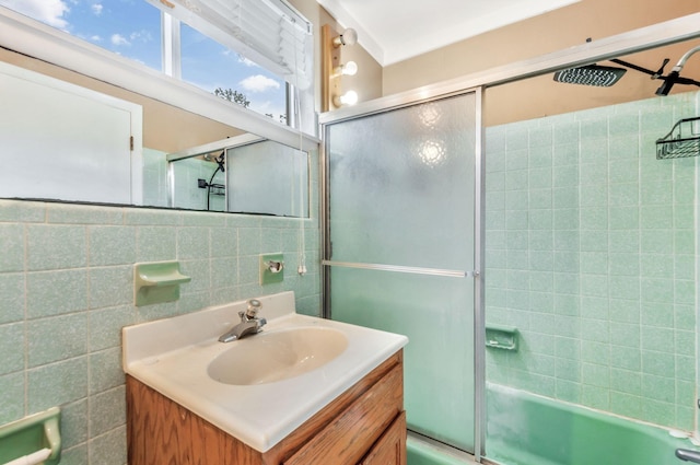 1033 Pine Valley Rd, Kingston Springs, TN 37082 - bathroom featuring vanity, tile walls, and combined bath / shower with glass door