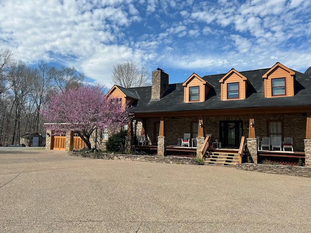 1374 Peter Pond Rd, Ashland City, TN 37015 - view of front of property featuring a porch, a chimney, and stone siding