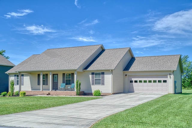 1570 Clemmons Rd, Cookeville, TN 38501 - view of front of home with covered porch, concrete driveway, an attached garage, a shingled roof, and a front yard