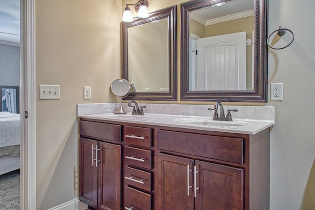 1570 Clemmons Rd, Cookeville, TN 38501 - ensuite bathroom featuring crown molding, double vanity, and baseboards