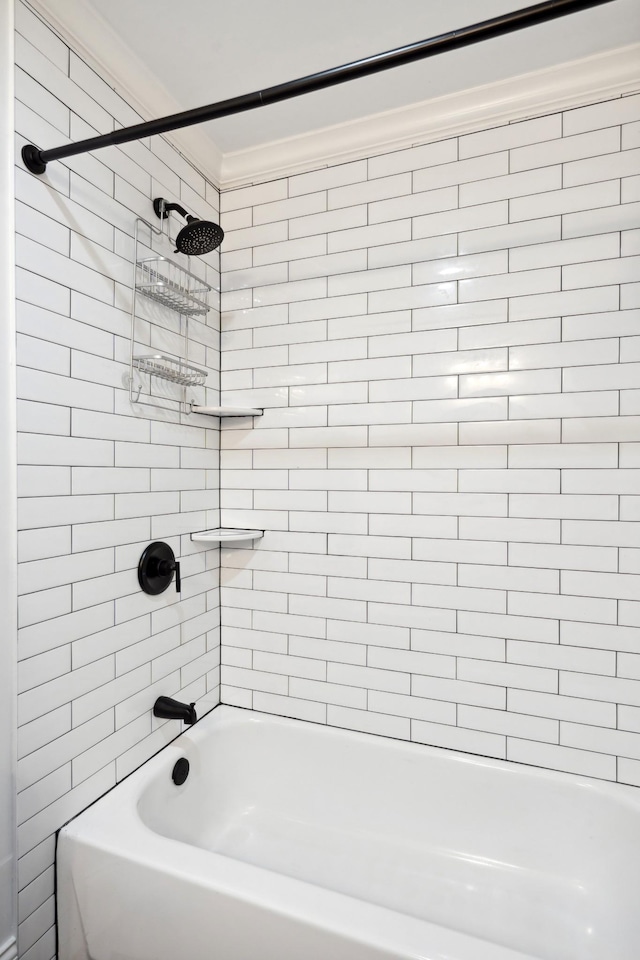 9702 Amethyst Ln, Brentwood, TN 37027 - bathroom featuring crown molding and washtub / shower combination