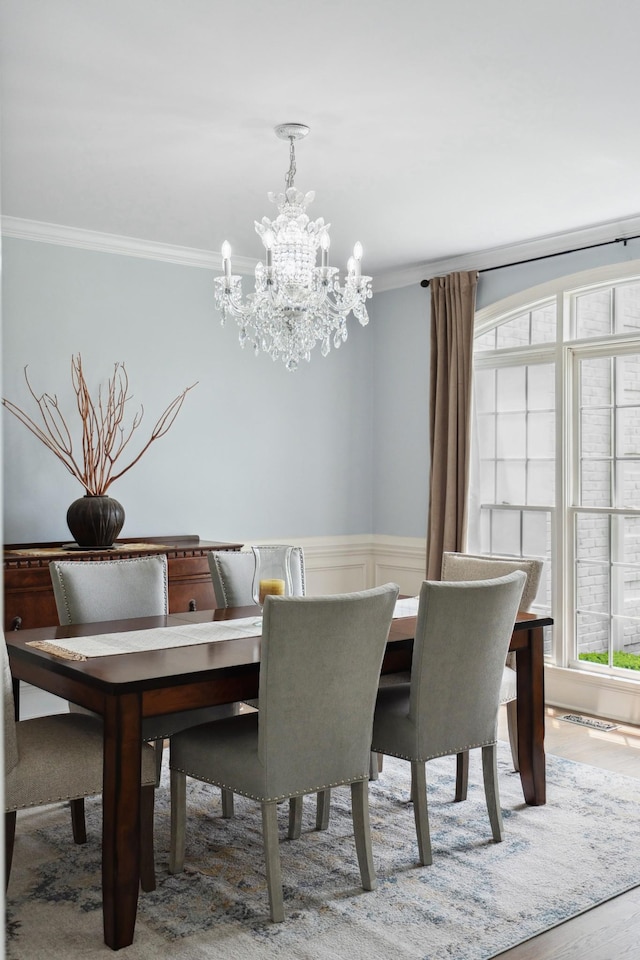 9702 Amethyst Ln, Brentwood, TN 37027 - dining space with crown molding, a chandelier, and wainscoting
