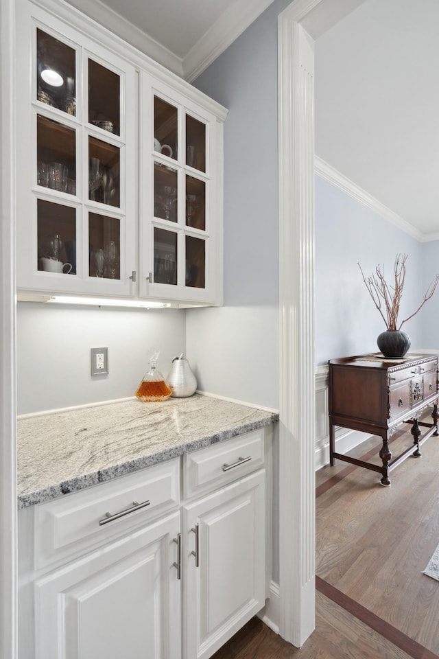 9702 Amethyst Ln, Brentwood, TN 37027 - bar area featuring crown molding and dark wood-type flooring