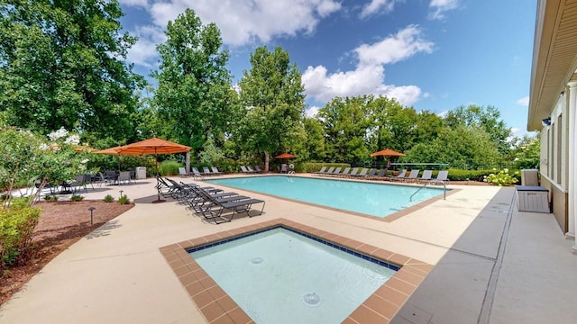 9702 Amethyst Ln, Brentwood, TN 37027 - community pool featuring a patio area, view of scattered trees, and fence