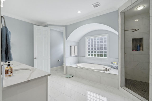 9702 Amethyst Ln, Brentwood, TN 37027 - bathroom with ornamental molding, a garden tub, a tile shower, toilet, and vanity