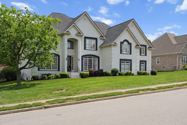 9702 Amethyst Ln, Brentwood, TN 37027 - french country style house with a front yard