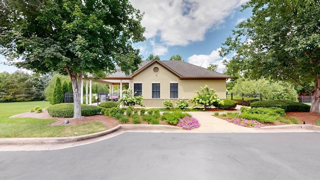 9702 Amethyst Ln, Brentwood, TN 37027 - view of front facade featuring fence and stucco siding