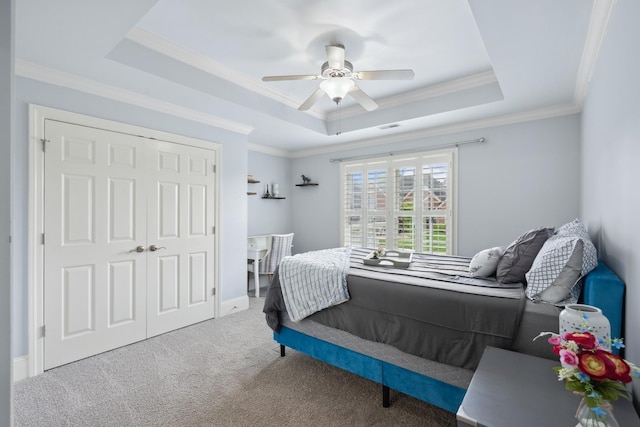 9702 Amethyst Ln, Brentwood, TN 37027 - bedroom featuring a raised ceiling, carpet, ornamental molding, ceiling fan, and a closet