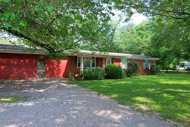 131 Kingwood Ln, Rockvale, TN 37153 - ranch-style house with a front lawn and driveway