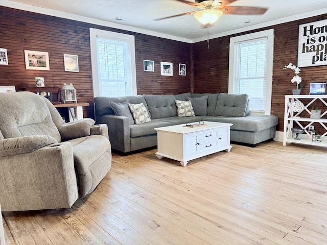 540 Grindstone Hollow Rd, Dickson, TN 37055 - living room featuring healthy amount of natural light, ceiling fan, light wood-type flooring, and crown molding