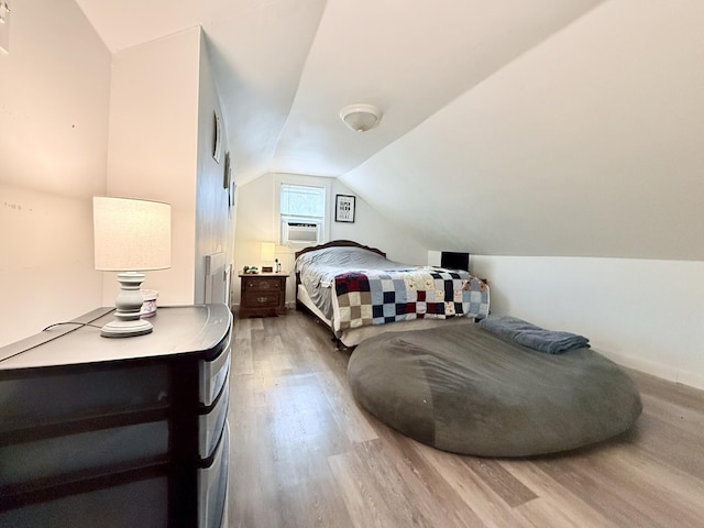 540 Grindstone Hollow Rd, Dickson, TN 37055 - bedroom with wood finished floors, lofted ceiling, and cooling unit
