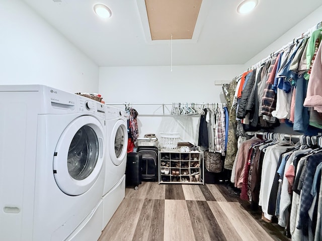 540 Grindstone Hollow Rd, Dickson, TN 37055 - laundry room with washing machine and clothes dryer, attic access, wood finished floors, and recessed lighting