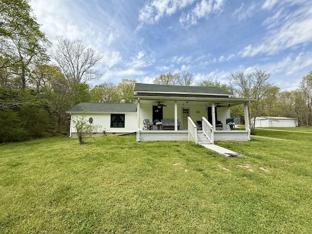 540 Grindstone Hollow Rd, Dickson, TN 37055 - rear view of house featuring a lawn, covered porch, and a ceiling fan