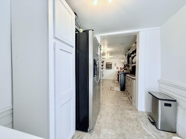540 Grindstone Hollow Rd, Dickson, TN 37055 - kitchen featuring stainless steel refrigerator with ice dispenser and white cabinets