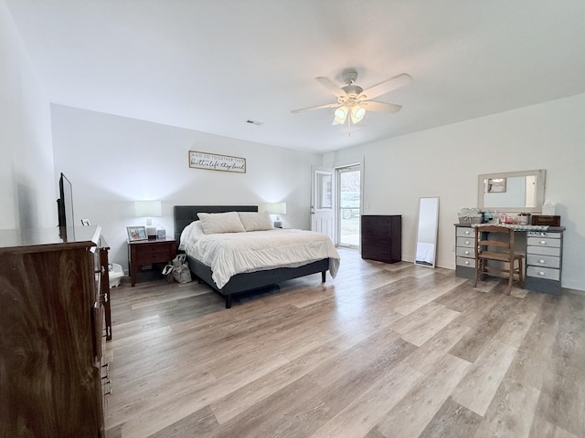 540 Grindstone Hollow Rd, Dickson, TN 37055 - bedroom featuring light wood finished floors, ceiling fan, and a desk
