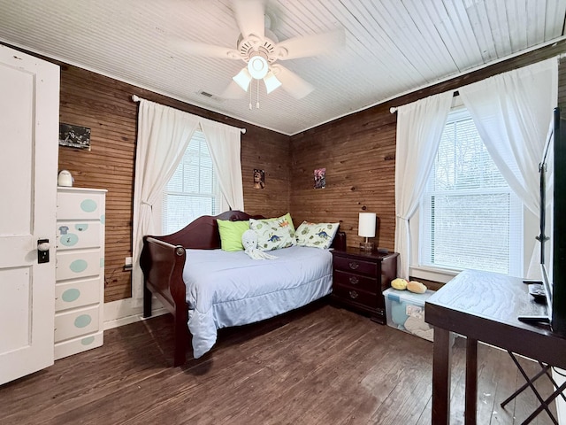 540 Grindstone Hollow Rd, Dickson, TN 37055 - bedroom featuring wood walls, dark wood finished floors, and a ceiling fan