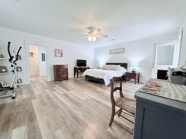 540 Grindstone Hollow Rd, Dickson, TN 37055 - bedroom with light wood finished floors, a ceiling fan, and an office area
