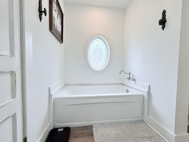 540 Grindstone Hollow Rd, Dickson, TN 37055 - full bath with a garden tub and wood finished floors