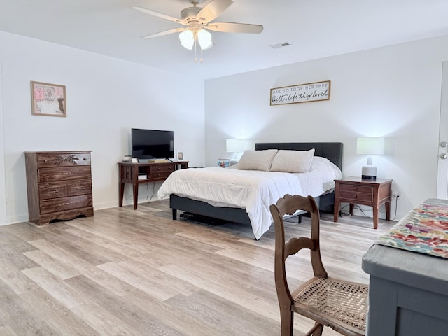 540 Grindstone Hollow Rd, Dickson, TN 37055 - bedroom with light wood-type flooring, a ceiling fan, and baseboards