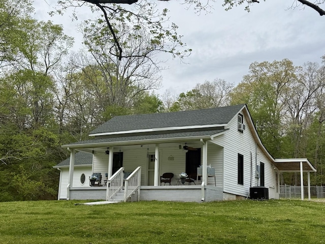 540 Grindstone Hollow Rd, Dickson, TN 37055 - view of front of home featuring a ceiling fan, covered porch, a front lawn, and roof with shingles