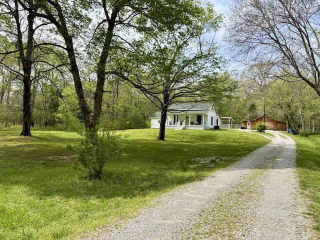 540 Grindstone Hollow Rd, Dickson, TN 37055 - view of front of property with driveway, a front yard, and a porch