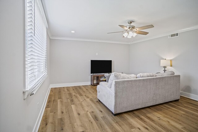 1301 Neelys Bend Rd Unit 50, Madison, TN 37115 - living area featuring baseboards, ceiling fan, light wood-type flooring, and ornamental molding