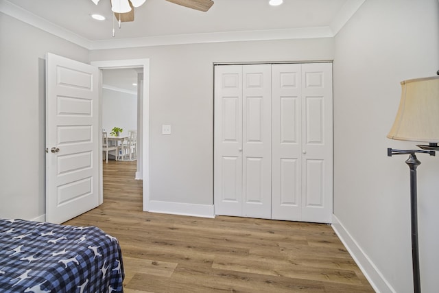 1301 Neelys Bend Rd Unit 50, Madison, TN 37115 - bedroom with ornamental molding, wood finished floors, baseboards, recessed lighting, and a closet