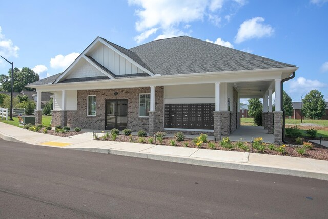 514 Rohan Dr, Murfreesboro, TN 37129 - view of front of home featuring brick siding, board and batten siding, and roof with shingles