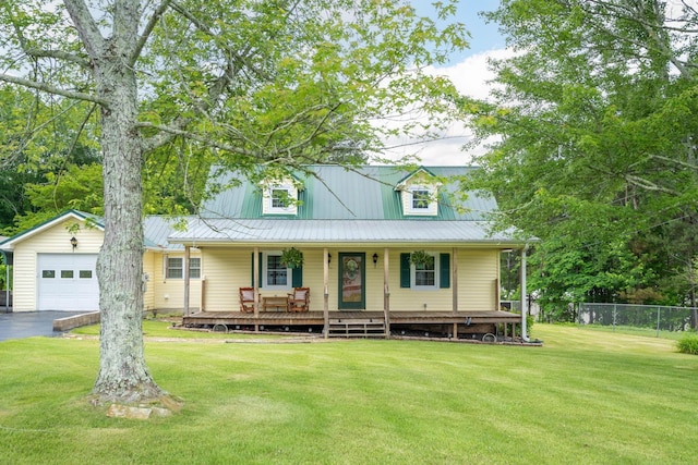 102 Hobbs Ridge Rd, Dunlap, TN 37327 - farmhouse inspired home with covered porch, metal roof, and asphalt driveway