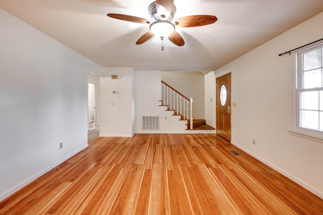 102 Hobbs Ridge Rd, Dunlap, TN 37327 - entryway with stairs, light wood-style flooring, ceiling fan, and baseboards