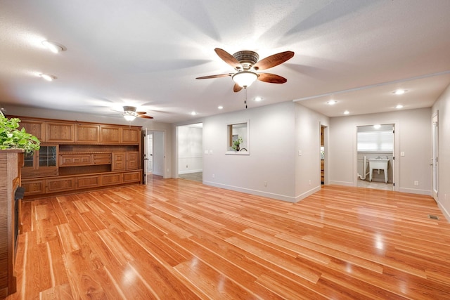102 Hobbs Ridge Rd, Dunlap, TN 37327 - unfurnished living room featuring ceiling fan, light wood-style floors, baseboards, and recessed lighting