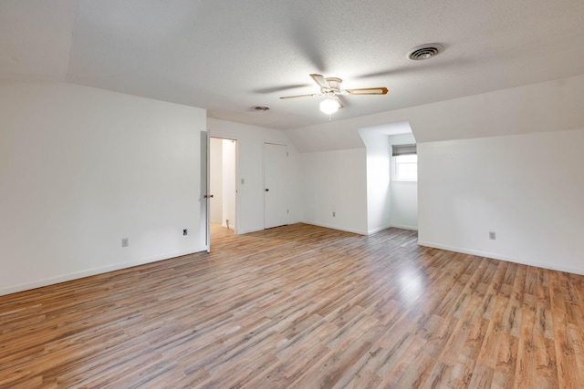 102 Hobbs Ridge Rd, Dunlap, TN 37327 - unfurnished room with vaulted ceiling, ceiling fan, light wood-style flooring, and baseboards