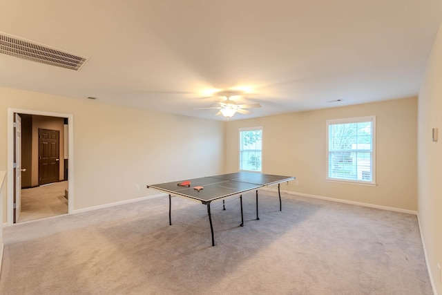 2004 Towhee Ct, Spring Hill, TN 37174 - recreation room with plenty of natural light, a ceiling fan, light colored carpet, and baseboards