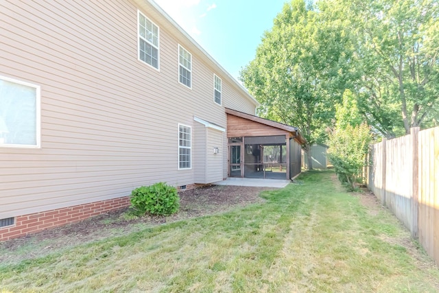 2004 Towhee Ct, Spring Hill, TN 37174 - view of yard featuring a sunroom and a patio area