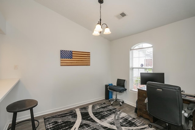 home office featuring wood finished floors, lofted ceiling, a chandelier, and baseboards