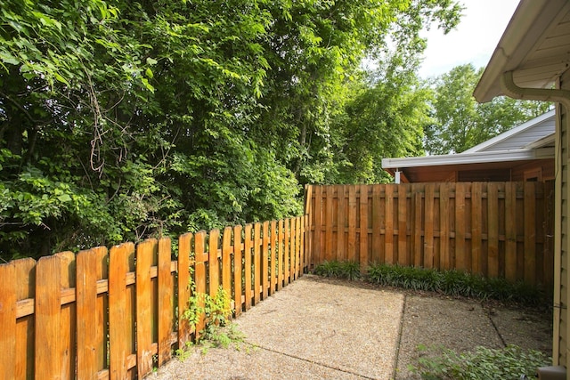 view of patio / terrace featuring fence