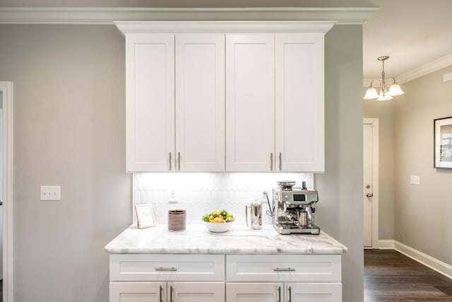 1551 Dobbins Pike, Gallatin, TN 37066 - kitchen featuring crown molding, dark wood-type flooring, baseboards, white cabinetry, and backsplash