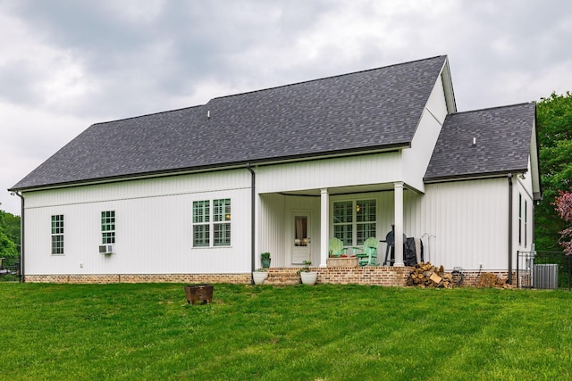 1551 Dobbins Pike, Gallatin, TN 37066 - rear view of house with a shingled roof, a yard, crawl space, cooling unit, and a porch