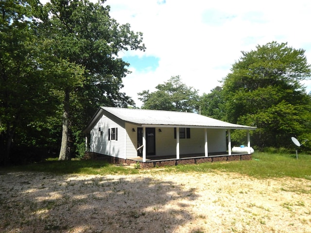 3355 Willie Mauldon Rd, Lutts, TN 38471 - rear view of house with covered porch