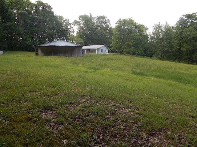 3355 Willie Mauldon Rd, Lutts, TN 38471 - view of yard featuring a carport