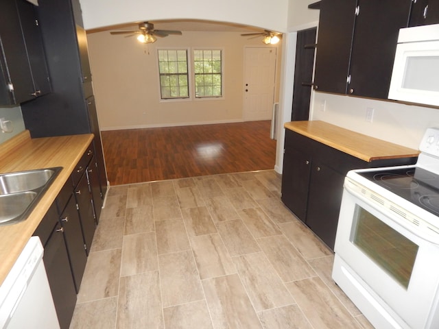 3355 Willie Mauldon Rd, Lutts, TN 38471 - kitchen featuring white appliances, a ceiling fan, light wood-style flooring, a sink, and open floor plan