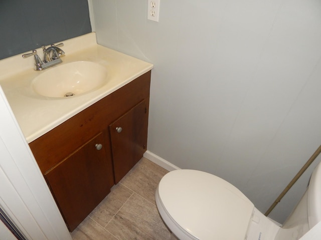 3355 Willie Mauldon Rd, Lutts, TN 38471 - bathroom featuring vanity, toilet, and baseboards