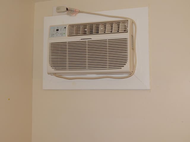3355 Willie Mauldon Rd, Lutts, TN 38471 - detailed view of a wall mounted AC