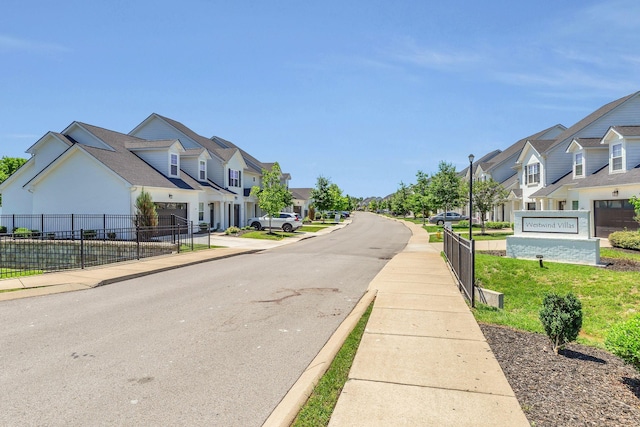 3507 Learning Ln, Murfreesboro, TN 37128 - view of asphalt street featuring sidewalks, a residential view, curbs, and street lights
