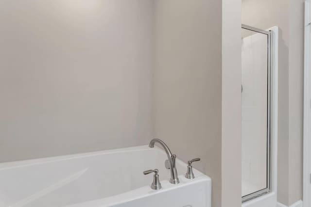 3507 Learning Ln, Murfreesboro, TN 37128 - bathroom featuring a stall shower and a garden tub