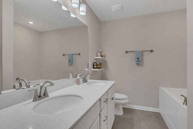 3507 Learning Ln, Murfreesboro, TN 37128 - bathroom featuring tile patterned floors, a garden tub, double vanity, toilet, and baseboards