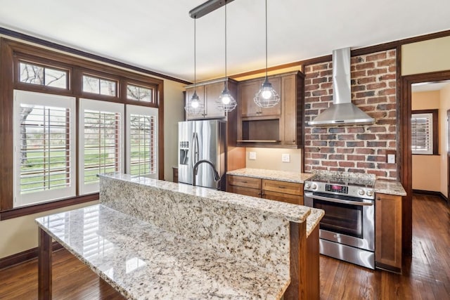 kitchen featuring appliances with stainless steel finishes, wall chimney exhaust hood, dark wood-style flooring, and a center island with sink